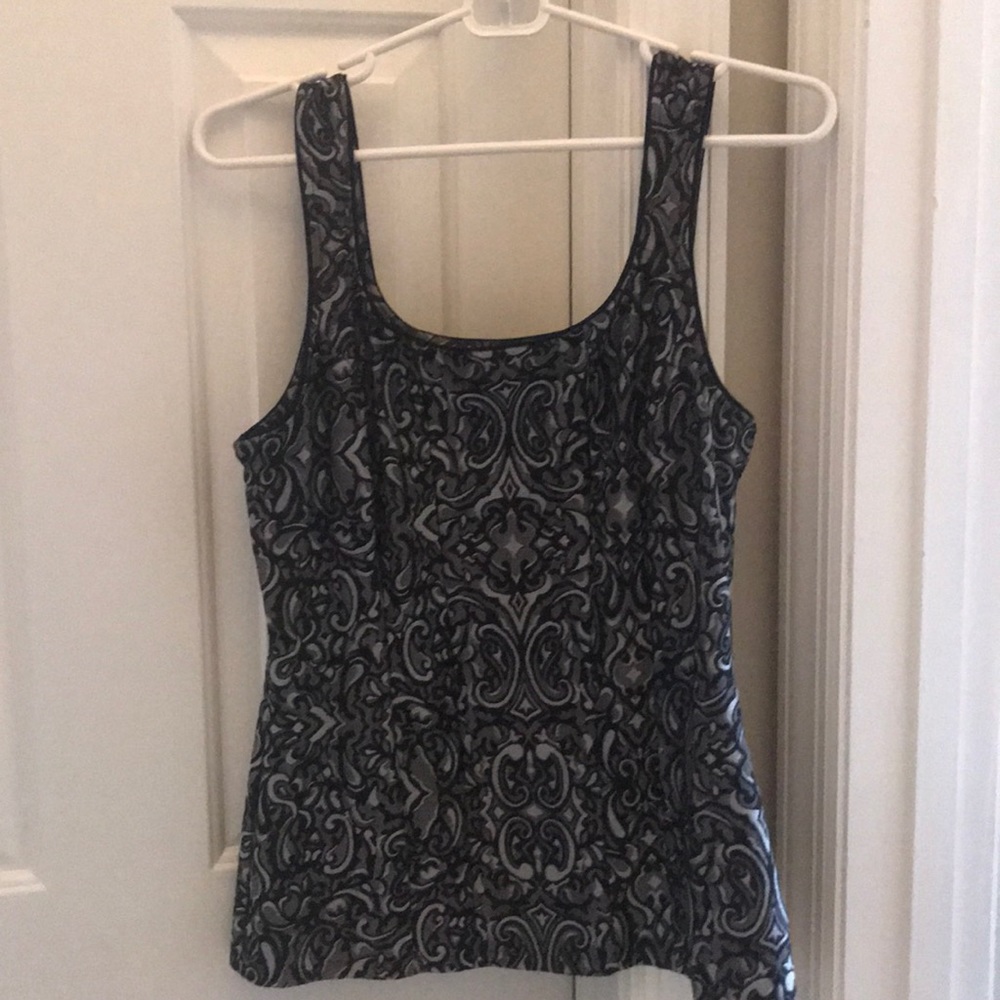 Silver, black tank
